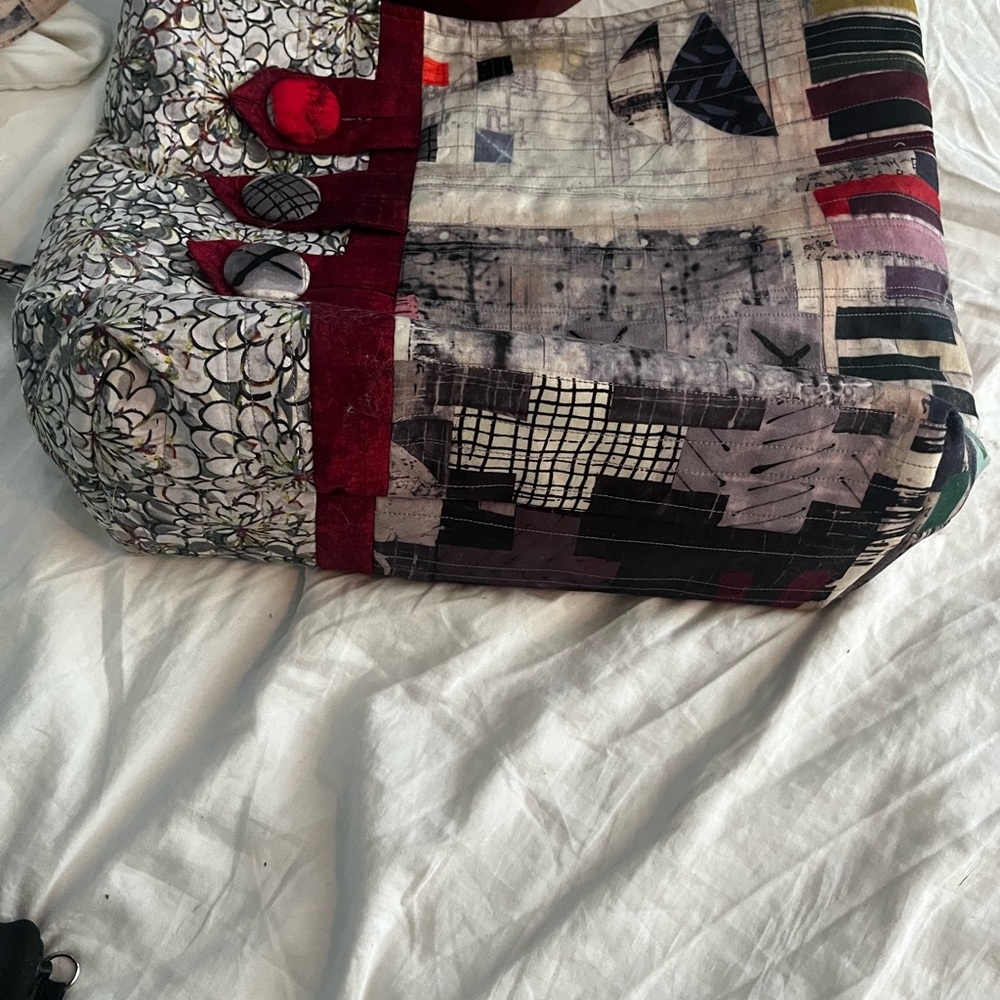 Buttons cross body bag.